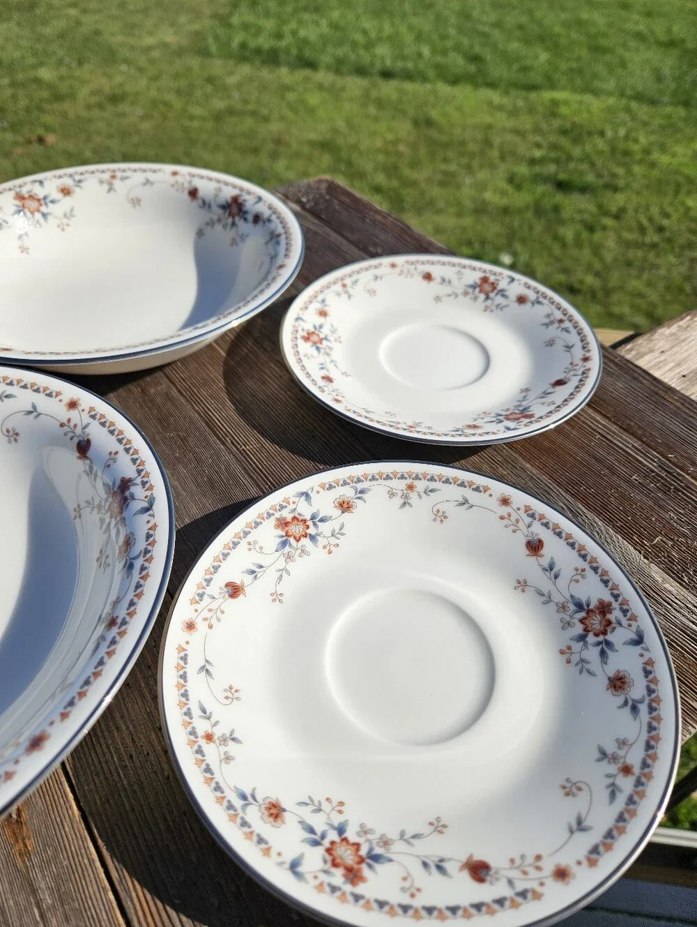 Noritake White Porcelain Dinnerware with Orange Floral Border